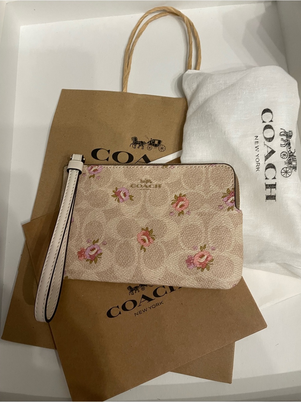 Coach Pink Floral corner zip Wristlet nwt all inclusive